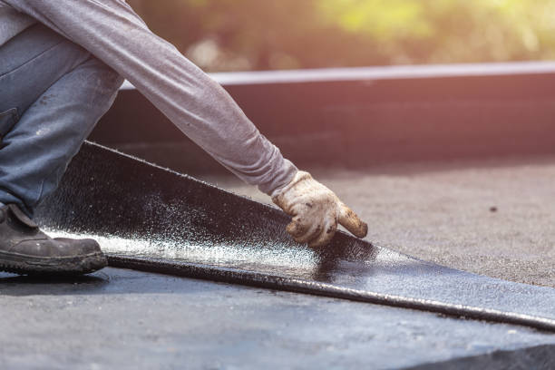 Professional Waterproofing technician working in Warrenton, OR